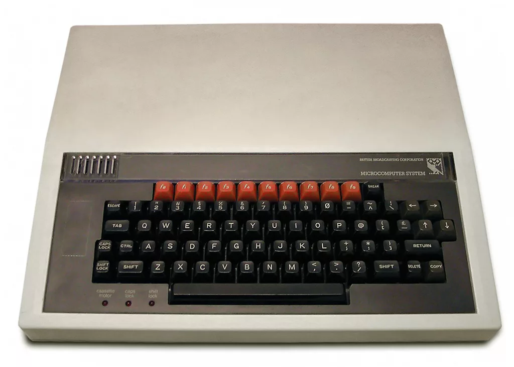 BBC Micro Model B in a cream case with a row of red function keys above the keyboard