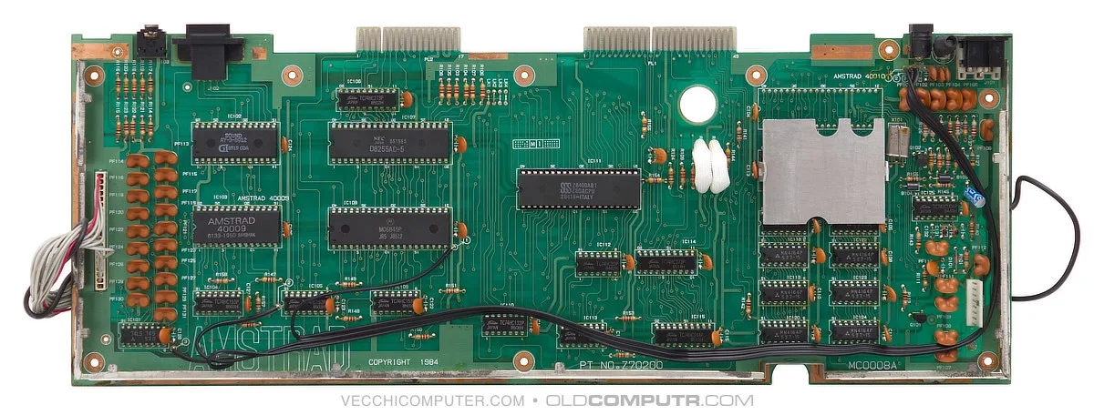 Amstrad CPC 464 motherboard, close-up photo showing the gate array, CRTC and AY-3-8912 sound chip