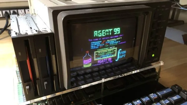 A modern hobbyist-built CoBra replica running a loading screen on a CRT monitor