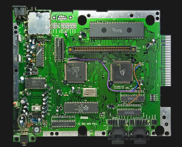 The Sega Genesis Model 1 motherboard showing the Motorola 68000 and Zilog Z80 chips