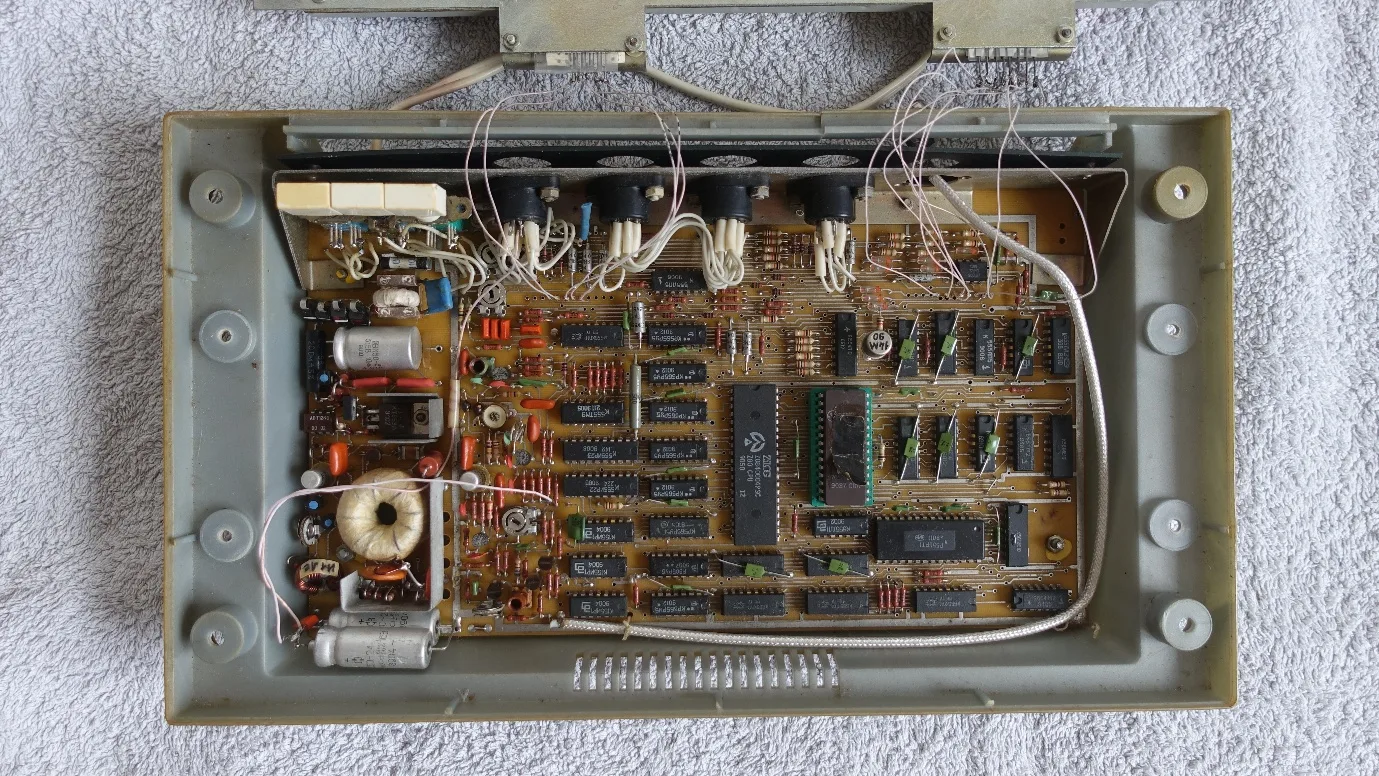 The open case of a Hobbit computer showing its internal circuit board