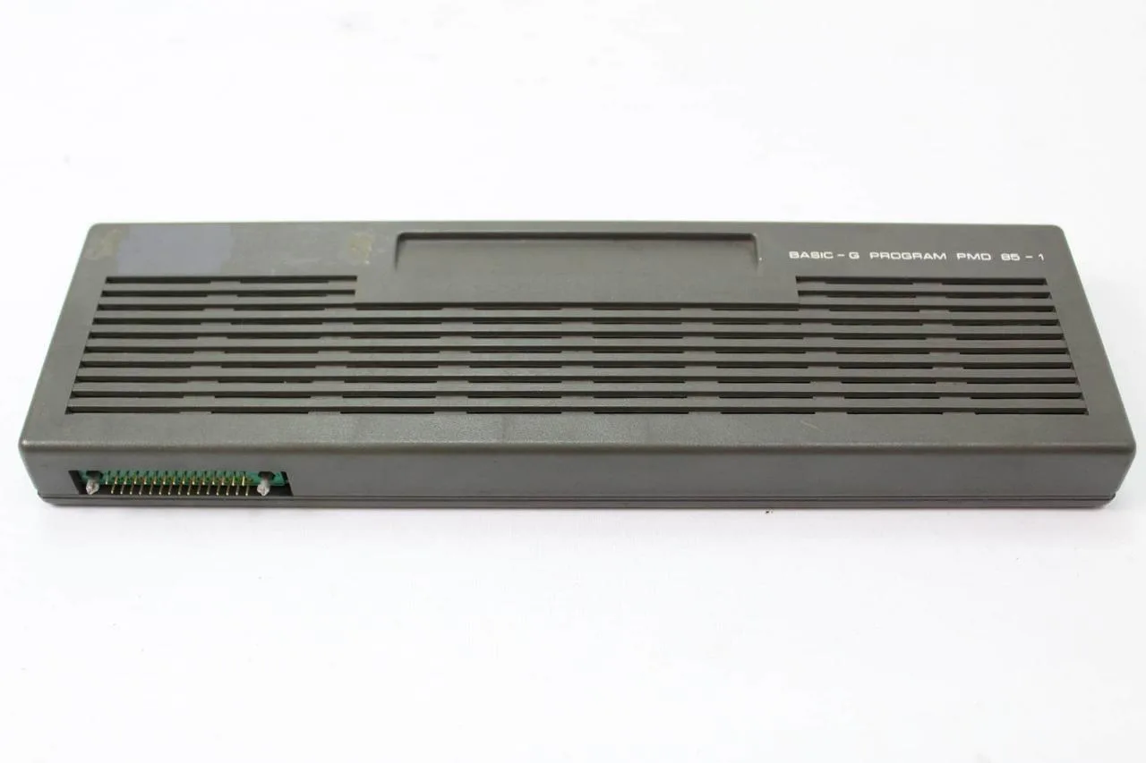A standard BASIC-G ROM cartridge for the PMD 85-1.