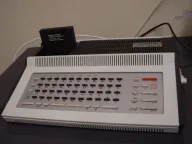 Robotron KC 85/1 East German home computer with an expansion module cartridge inserted, keyboard and casing visible