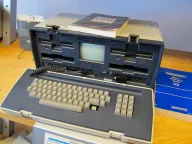 Osborne 1 portable computer open on a shelf at a computer museum