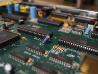 Close-up of an Amiga 500 Plus motherboard showing the Paula chip position and other custom chips
